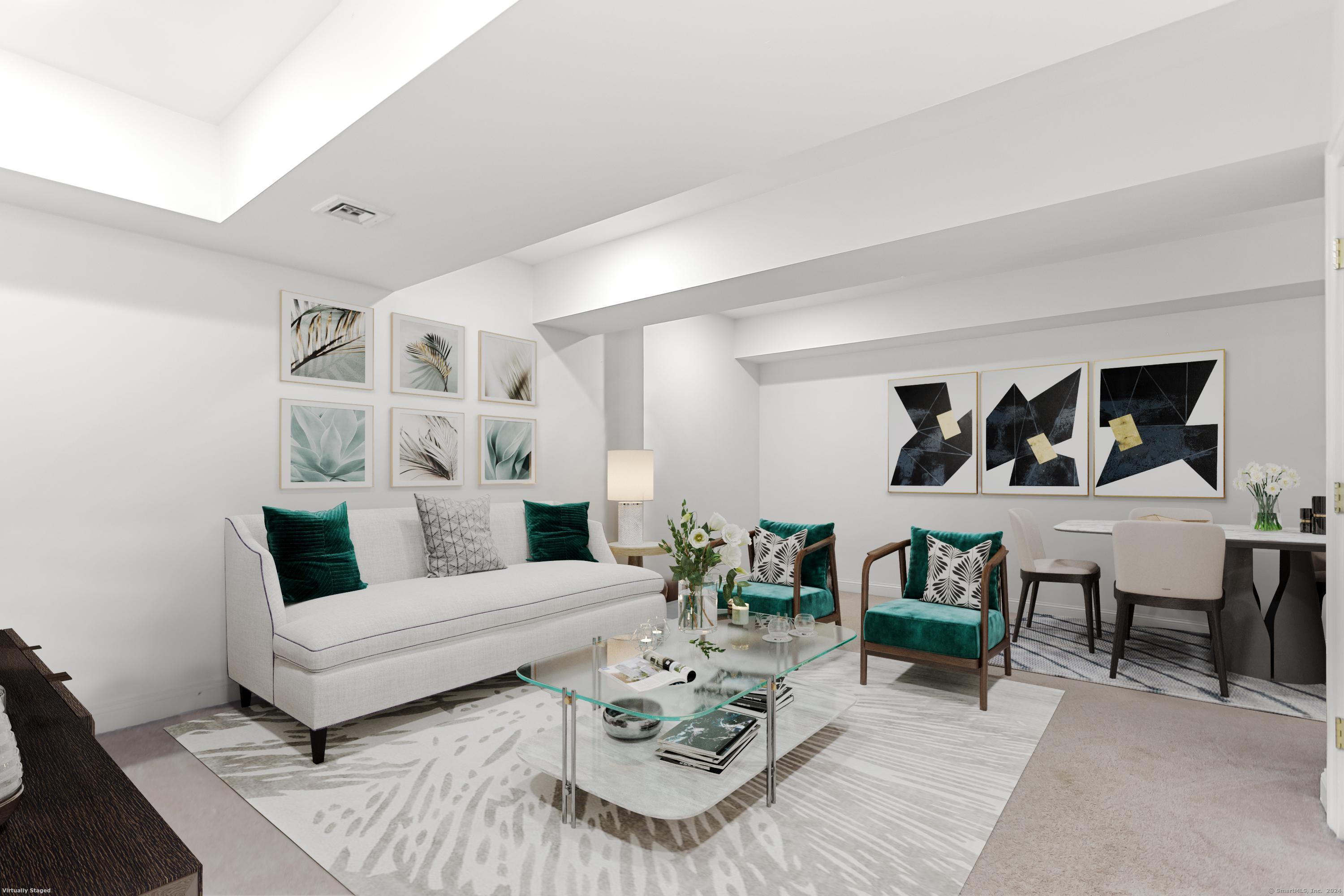 28 Rock Spring Road, Unit B2 Stamford, CT 06906 - Photo 27 of 32 a living room with furniture and wooden floor