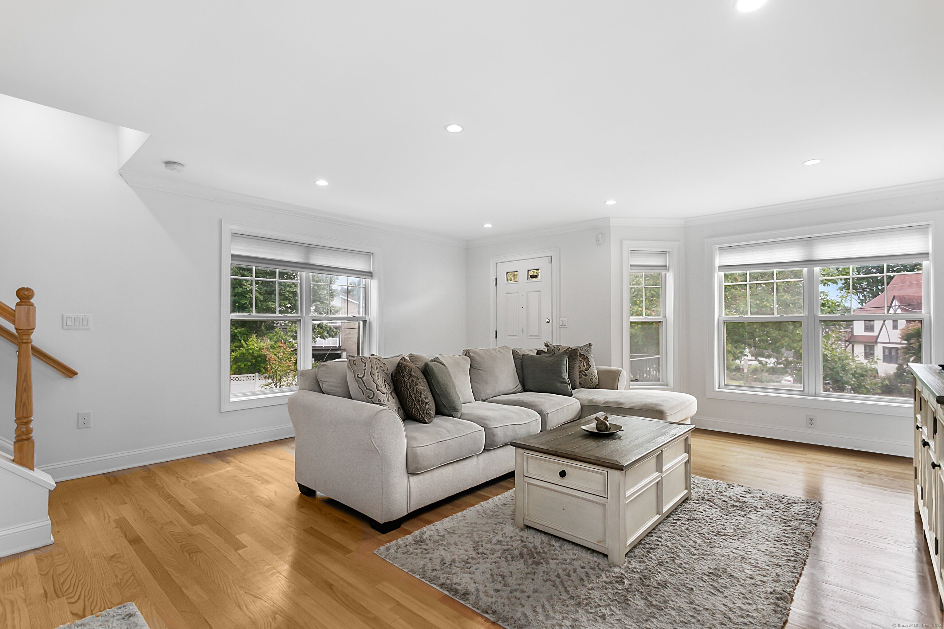 28 Rock Spring Road, Unit B2 Stamford, CT 06906 - Photo 5 of 32 a living room with furniture and a large window