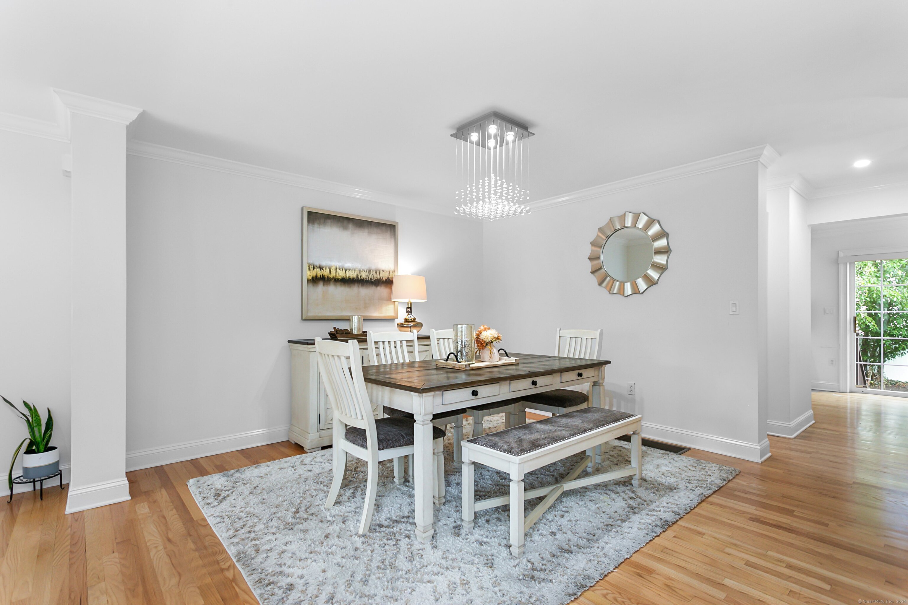 28 Rock Spring Road, Unit B2 Stamford, CT 06906 - Photo 7 of 32 a view of a dining room with furniture and wooden floor