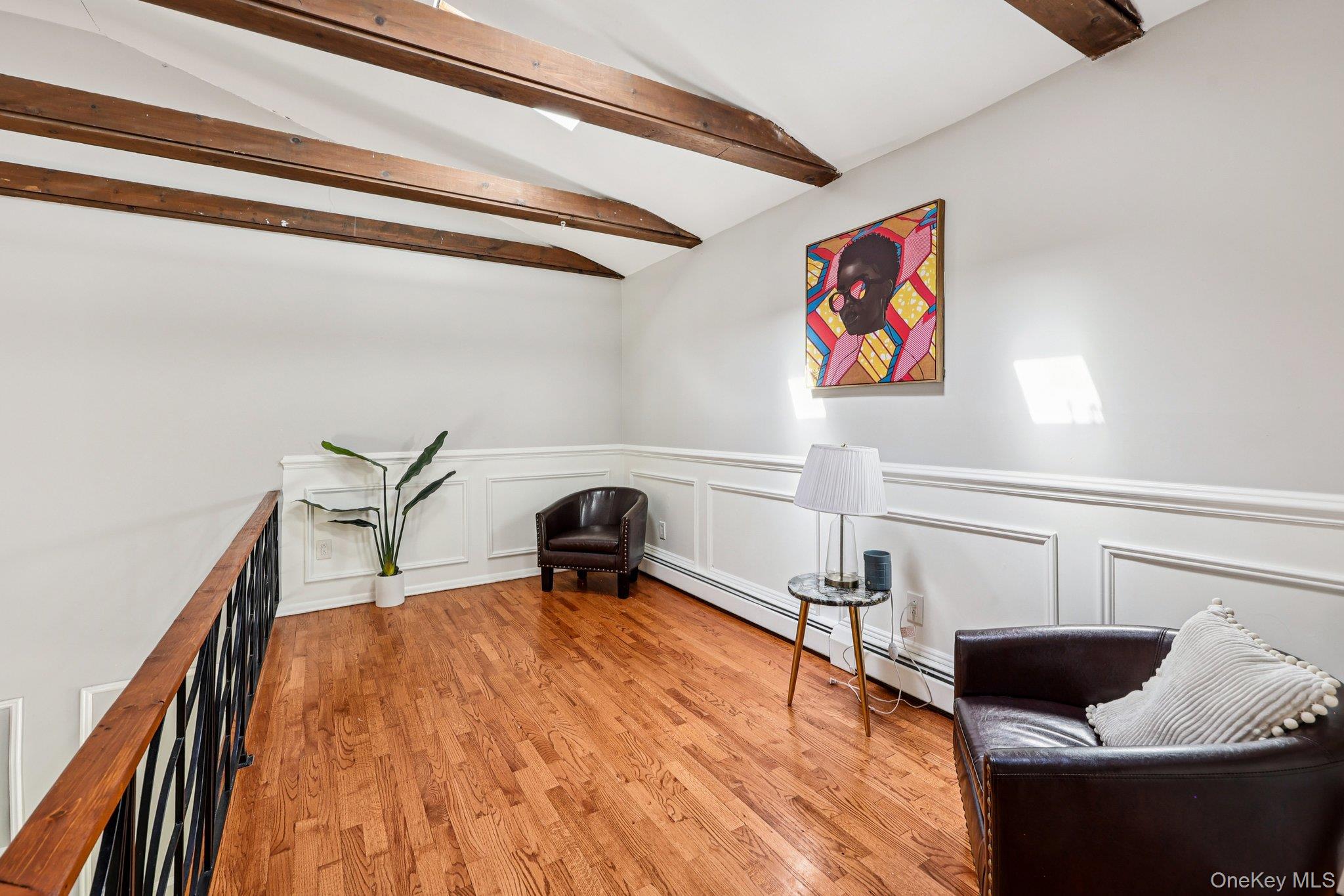 9 Crane Road Middletown, NY 10941 - Photo 16 of 31 Living area featuring wainscot walls, and wood finished floors