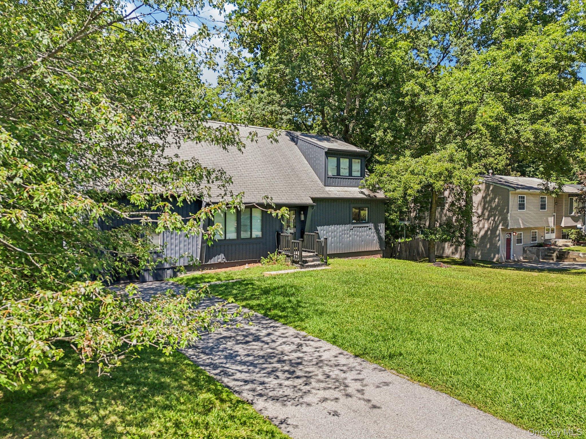 9 Crane Road Middletown, NY 10941 - Photo 27 of 31 View of front of home featuring a front lawn and a shingled roof