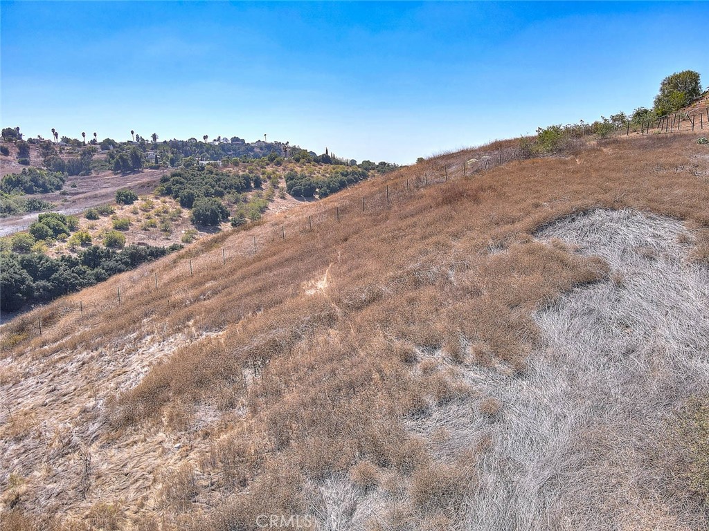 25 Franciscan Place Phillips Ranch, CA 91766 - Photo 11 of 21 an aerial view of mountain and tree in the background