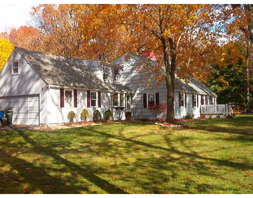 946 Plumtree Road Springfield, MA 01119 - Photo 3 of 4 a front view of a house with a garden