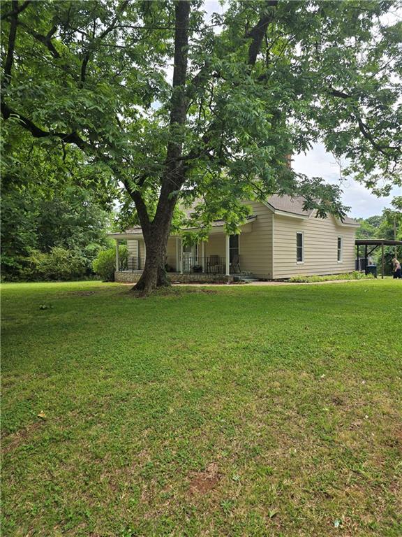 2863 Maysville Road Commerce, GA 30529 - Photo 15 of 15 a view of a house with a yard