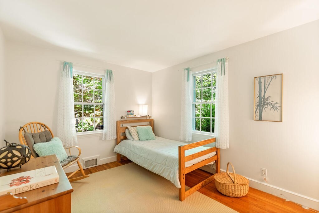 24 Blake Road Lexington, MA 02420 - Photo 12 of 30 a bedroom with a bed and a window