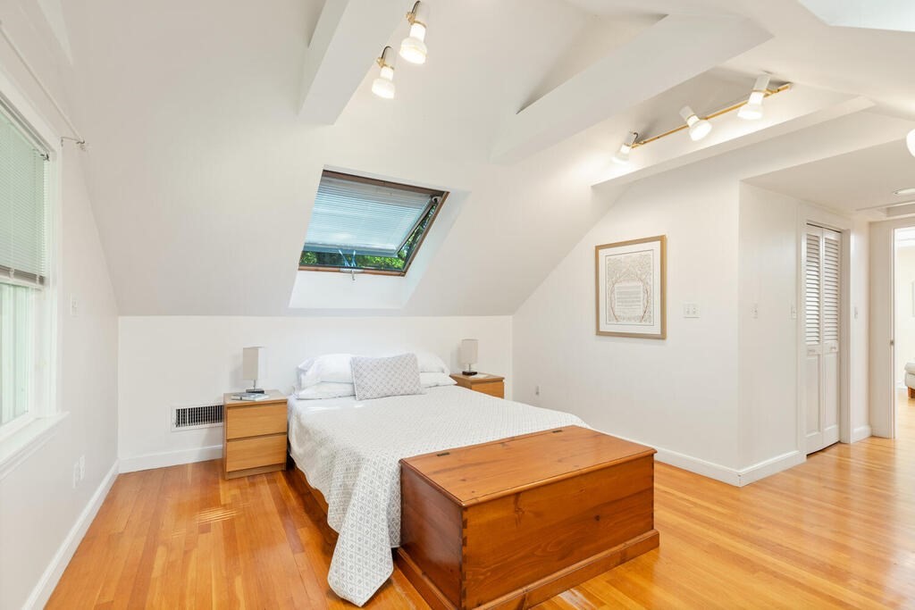 24 Blake Road Lexington, MA 02420 - Photo 15 of 30 a bedroom with a bed and wooden floor