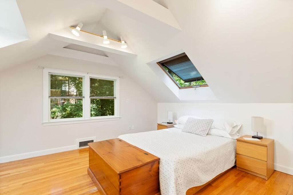 24 Blake Road Lexington, MA 02420 - Photo 16 of 30 a bedroom with a bed and window