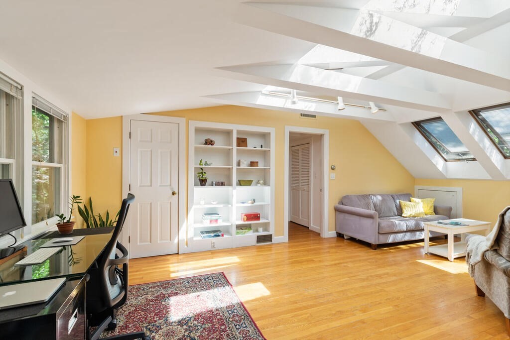 24 Blake Road Lexington, MA 02420 - Photo 23 of 30 a living room with furniture and a flat screen tv