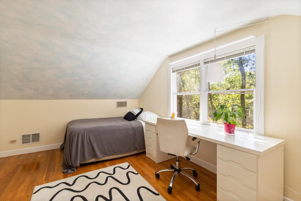 24 Blake Road Lexington, MA 02420 - Photo 26 of 30 a bed room with a bed and a window