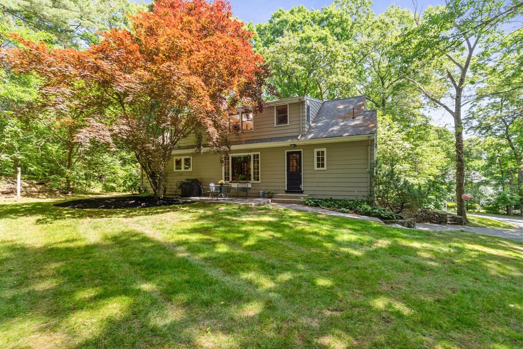 24 Blake Road Lexington, MA 02420 - Photo 30 of 30 front view of a house with a yard