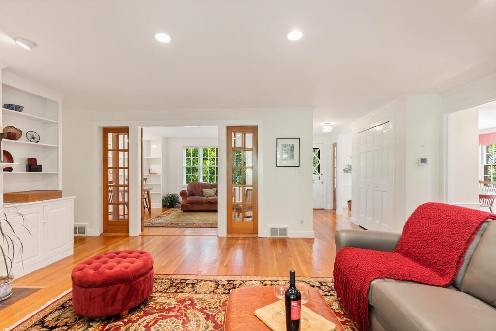 24 Blake Road Lexington, MA 02420 - Photo 6 of 30 a living room with furniture and a wooden floor