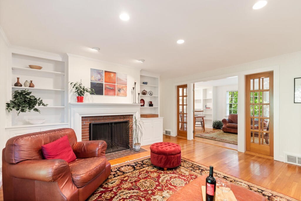 24 Blake Road Lexington, MA 02420 - Photo 7 of 30 a living room with furniture and a fireplace