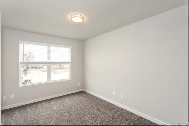 an empty room with a window