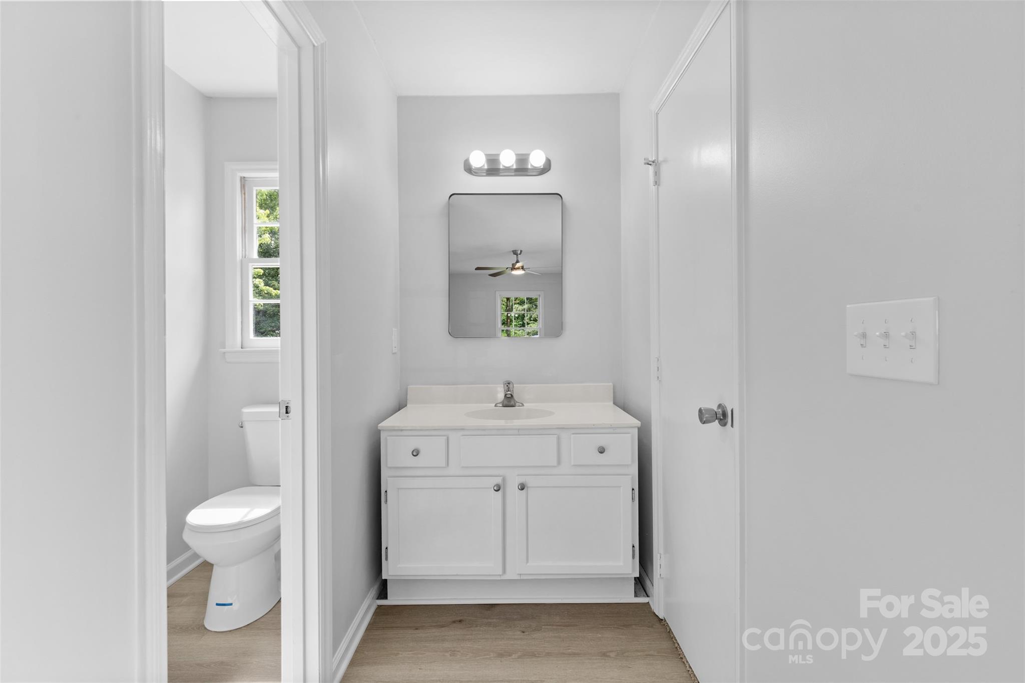 6412 Sullins Road Charlotte, NC 28214 - Photo 20 of 25 a bathroom with a sink a toilet and shower