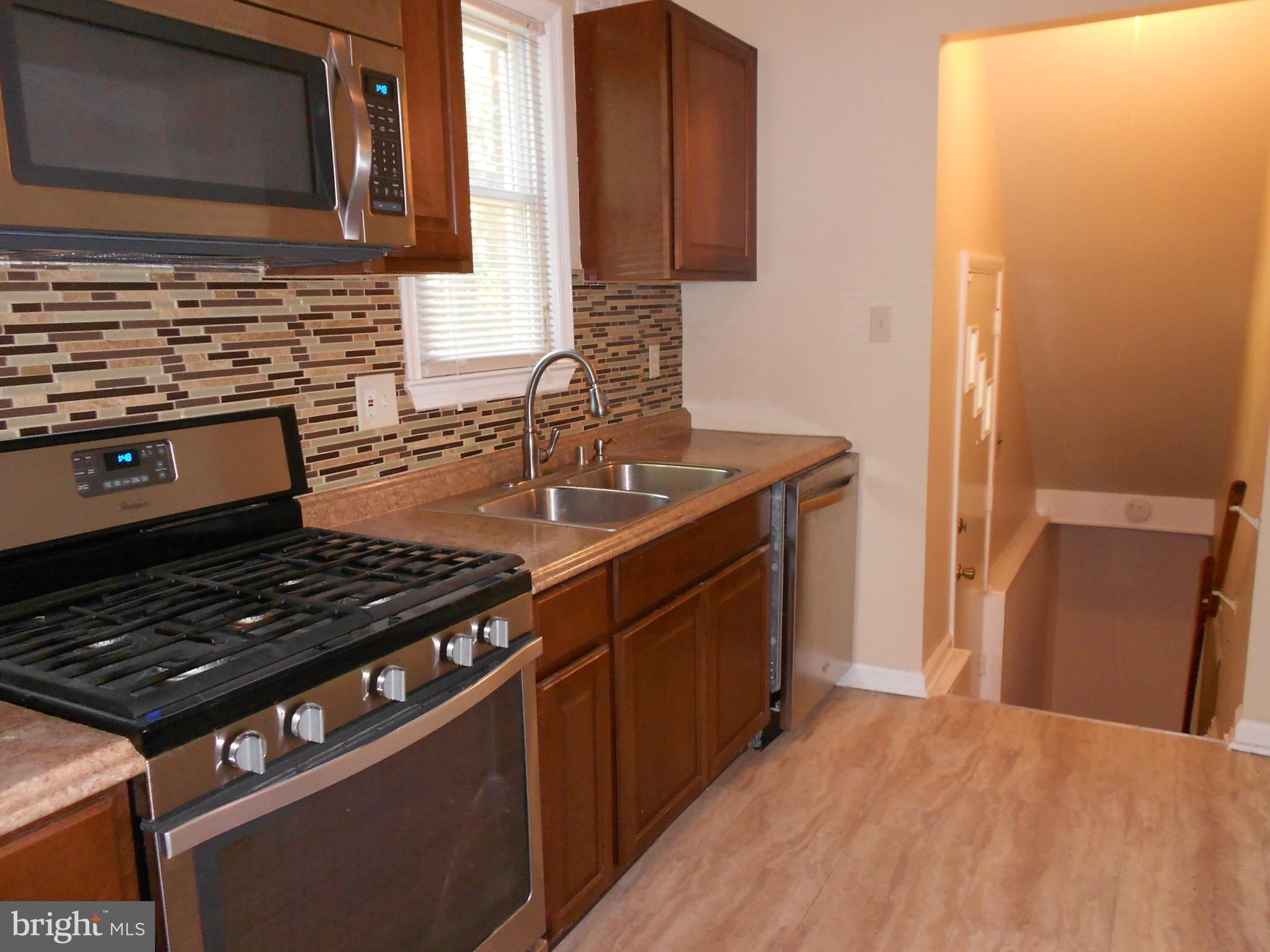 5724 Van Dyke Road Baltimore, MD 21206 - Photo 12 of 35 Kitchen Has Open Access to LL & Side Door