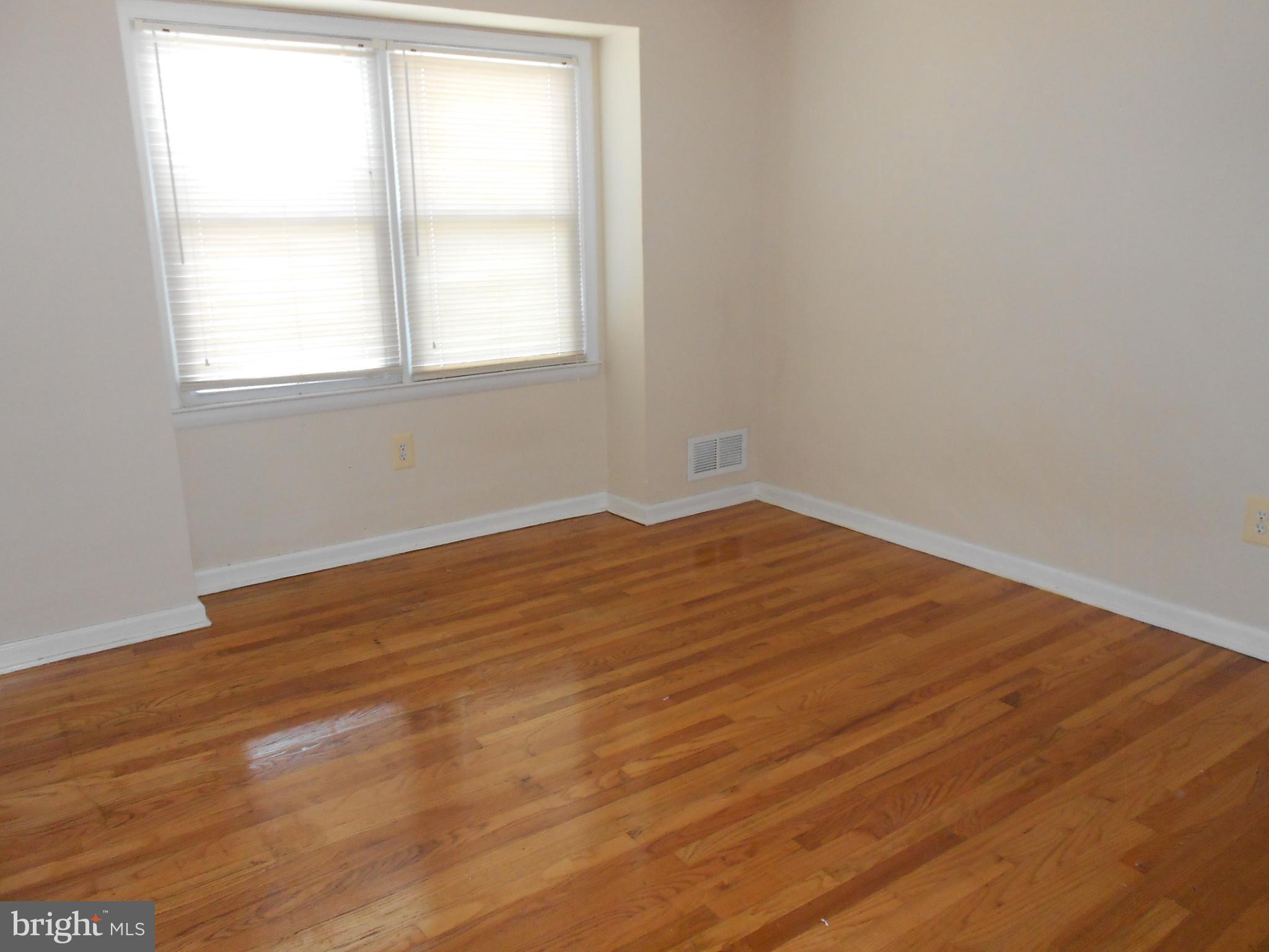 5724 Van Dyke Road Baltimore, MD 21206 - Photo 13 of 35 Master Bedroom - Hardwood Floors