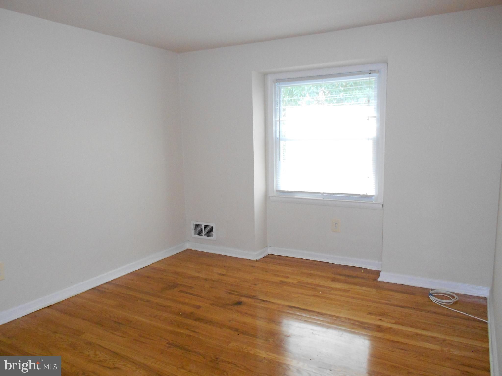 5724 Van Dyke Road Baltimore, MD 21206 - Photo 15 of 35 Sun-lit Second Bedroom - Hardwood Floor