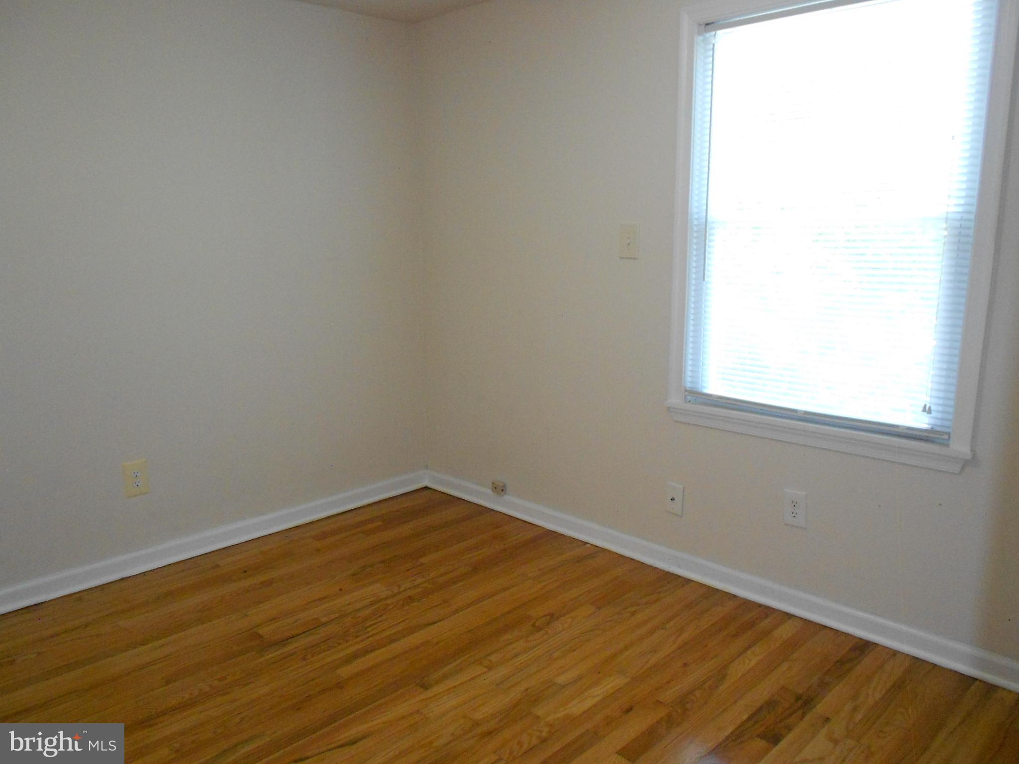 5724 Van Dyke Road Baltimore, MD 21206 - Photo 17 of 35 Third bedroom - Hardwood Floor