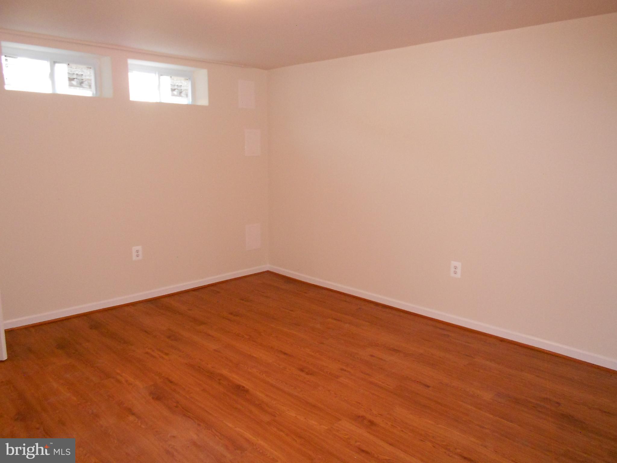 5724 Van Dyke Road Baltimore, MD 21206 - Photo 22 of 35 Easy Maintenance Laminate Flooring in FR