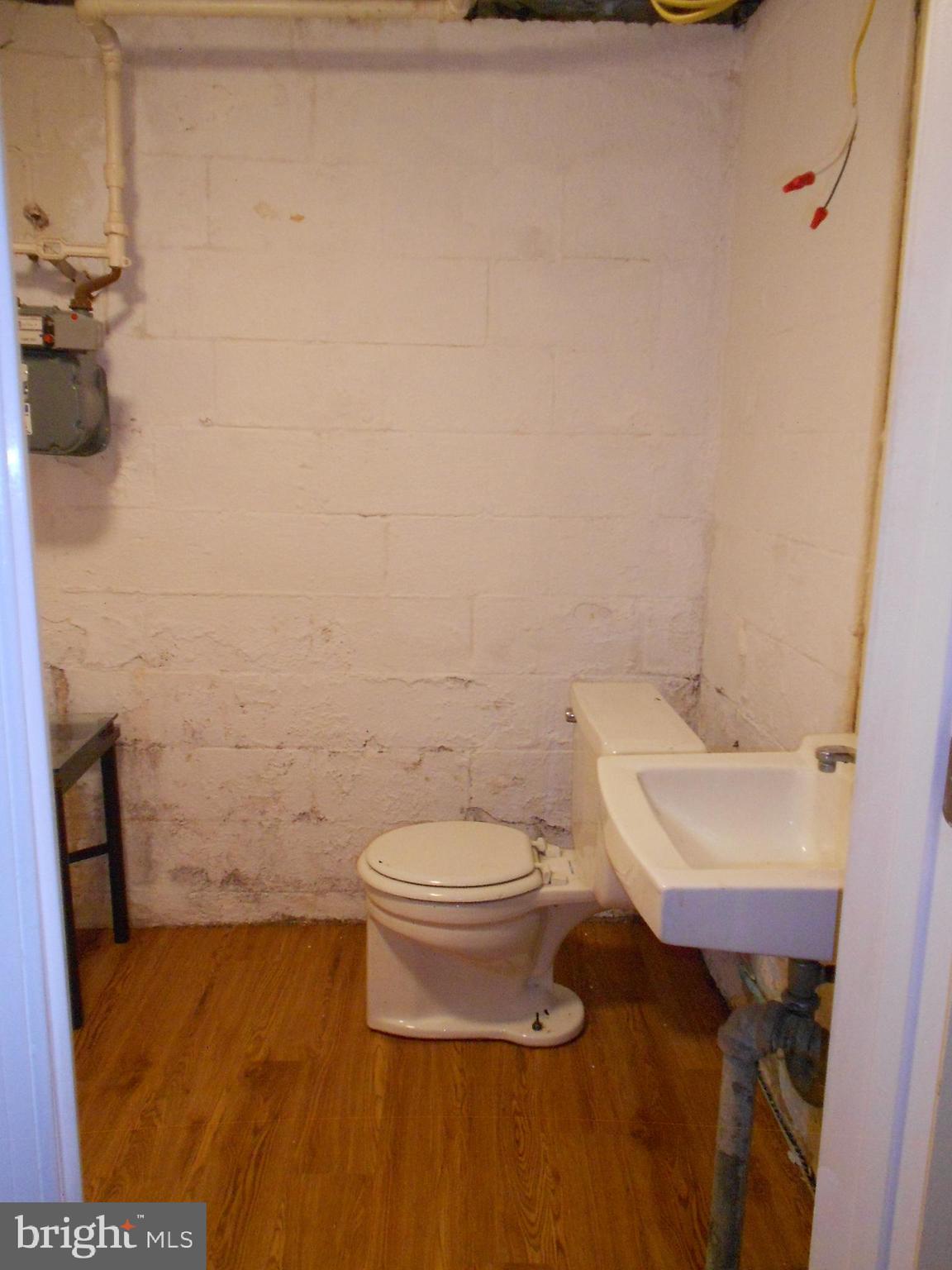 5724 Van Dyke Road Baltimore, MD 21206 - Photo 23 of 35 Lower Level Powder Room
