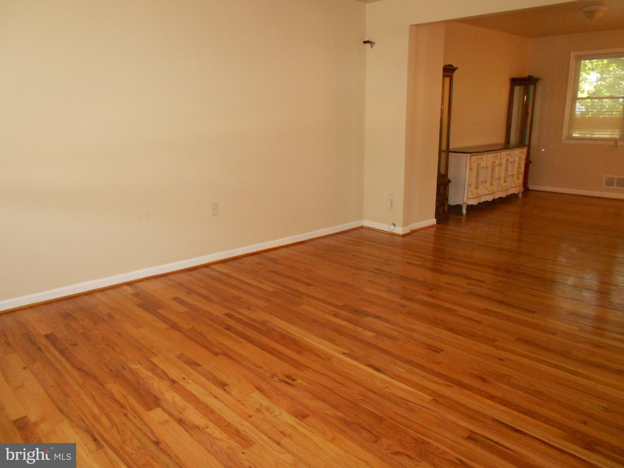 5724 Van Dyke Road Baltimore, MD 21206 - Photo 4 of 35 Spacious Living Room w/Hardwood Floor