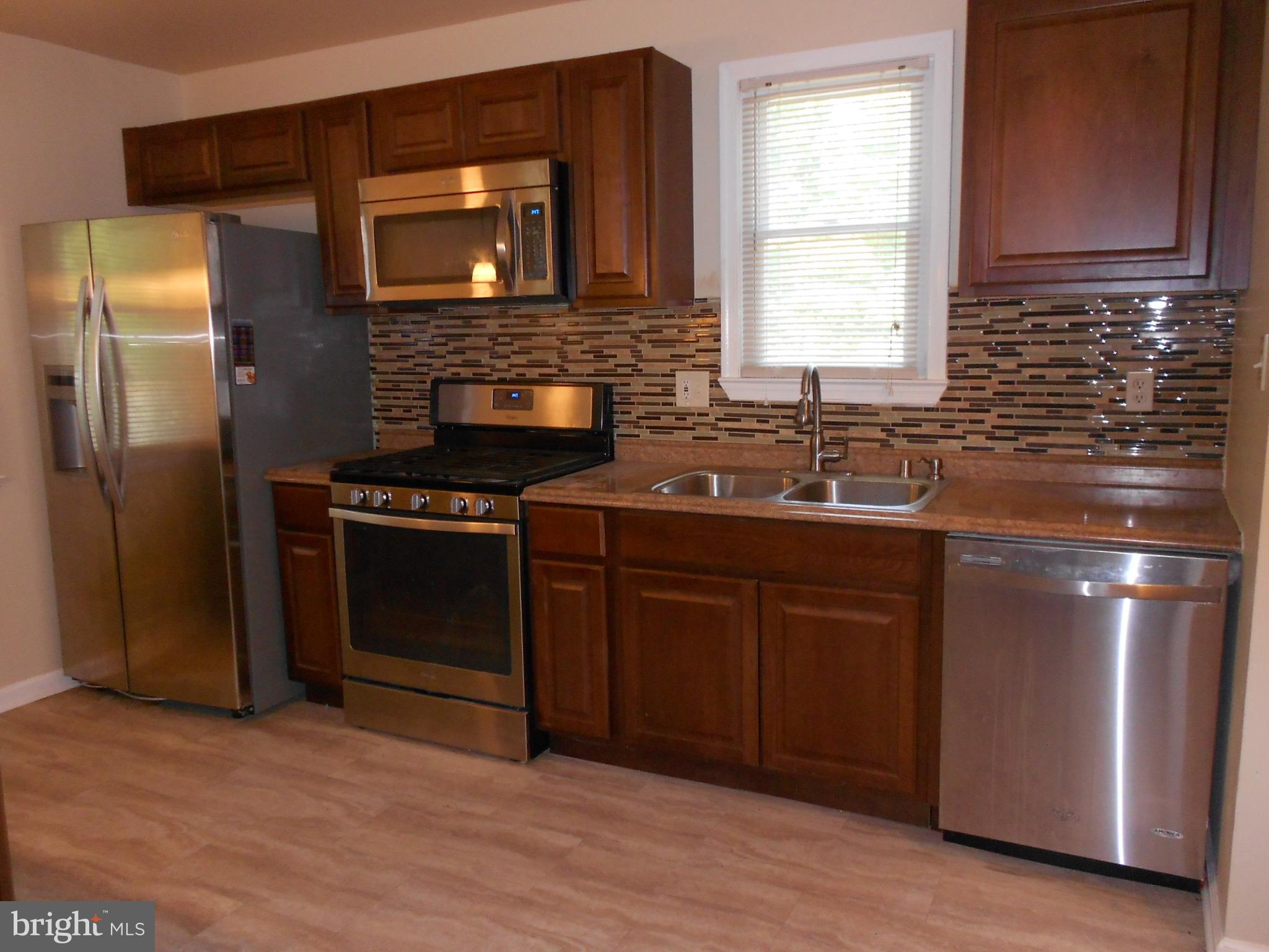 5724 Van Dyke Road Baltimore, MD 21206 - Photo 9 of 35 Updated Kitchen w/Stainless Appliances
