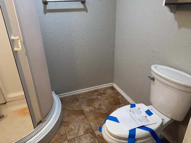 a bathroom with a sink and toilet