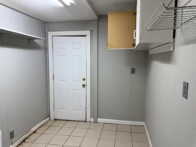 a view of bathroom with dual sinks