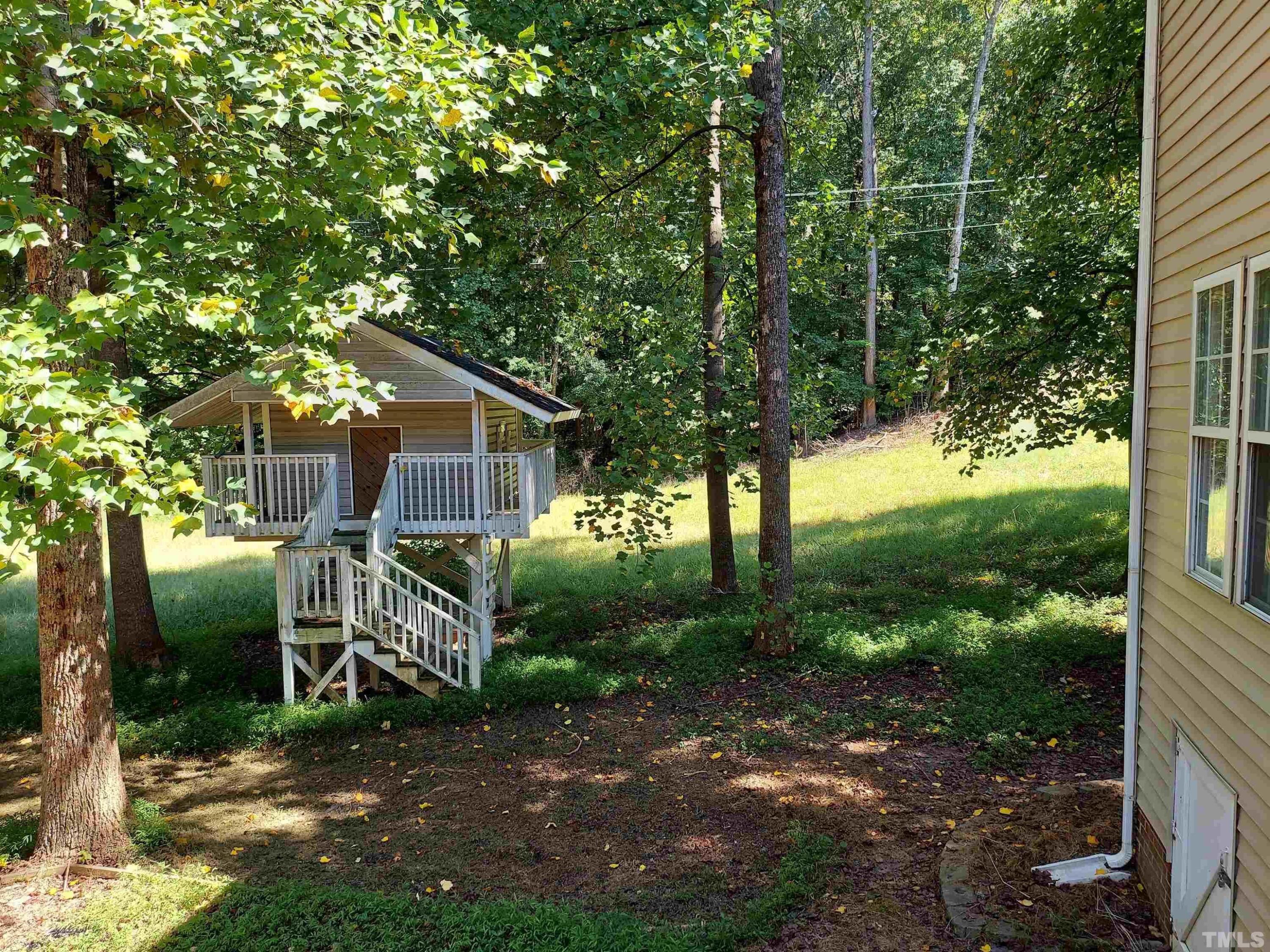 224 Crossfire Road Holly Springs, NC 27540 - Photo 43 of 43 a view of a house with backyard