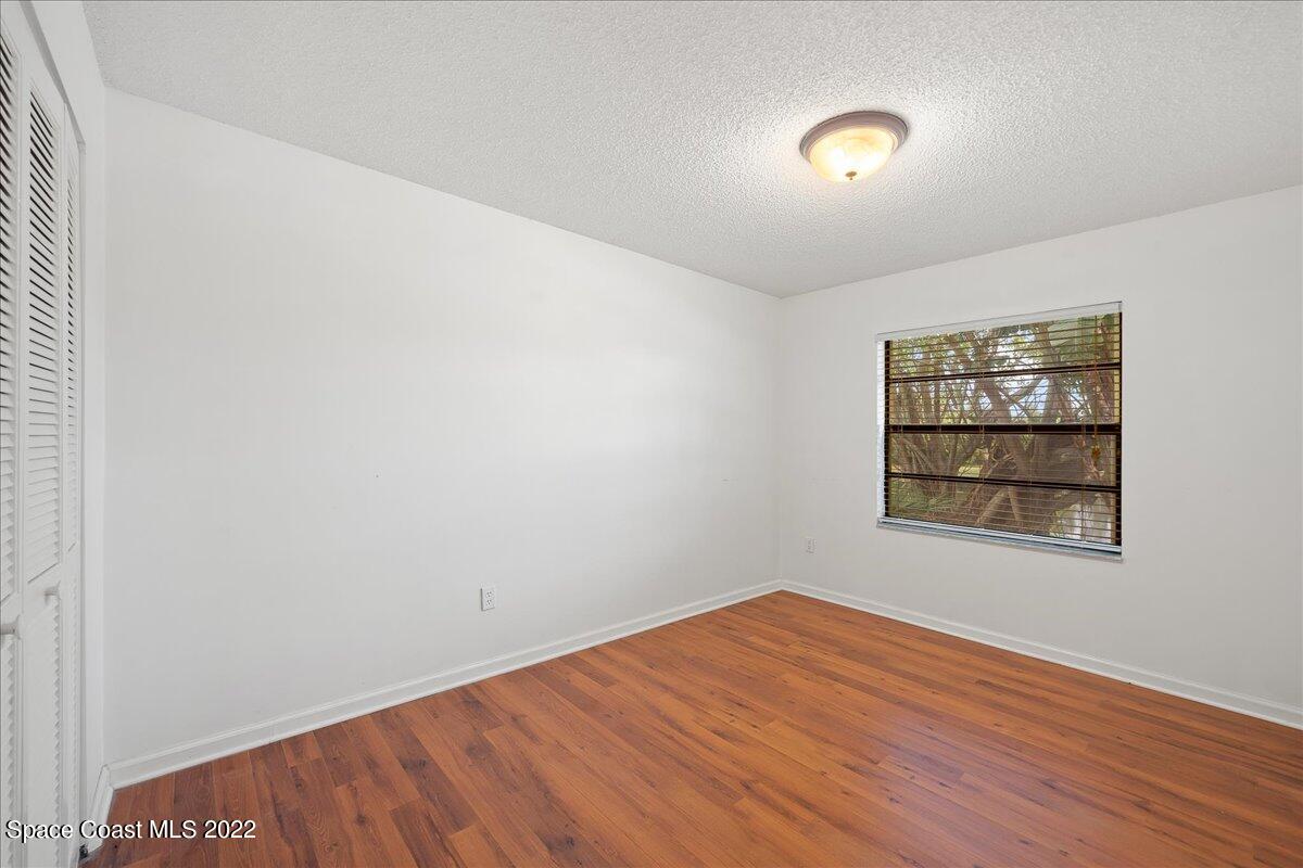 3709 Tree Line Boulevard Melbourne, FL 32935 - Photo 17 of 22 an empty room with a window
