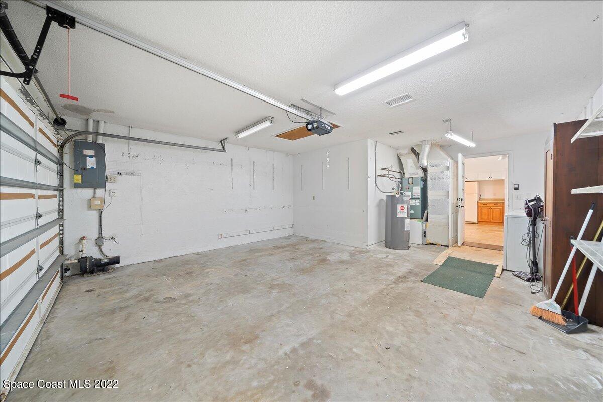 3709 Tree Line Boulevard Melbourne, FL 32935 - Photo 18 of 22 a view of a garage