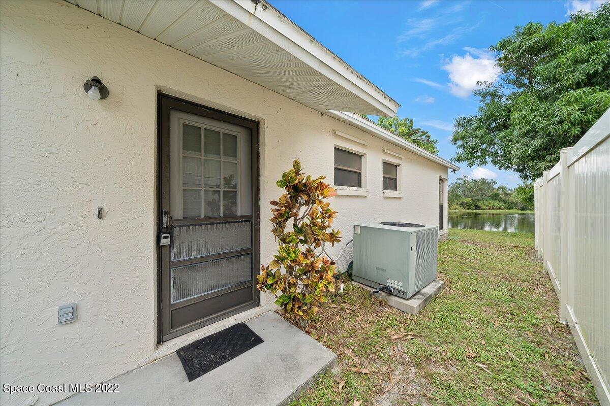 3709 Tree Line Boulevard Melbourne, FL 32935 - Photo 3 of 22 a backyard of a house