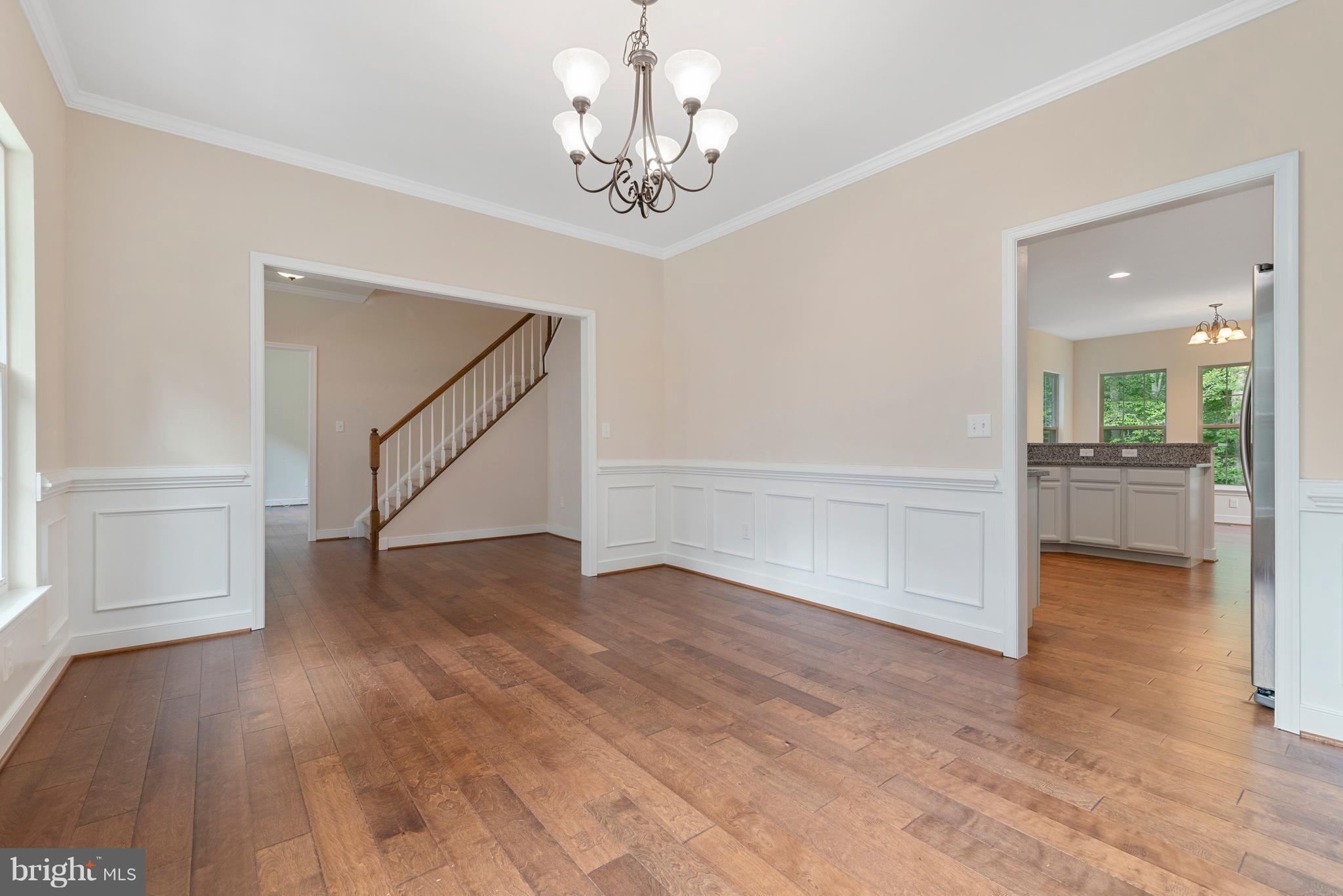 138 Sandy Ridge Road Fredericksburg, VA 22405 - Photo 12 of 30 wooden floor in an empty room with a window
