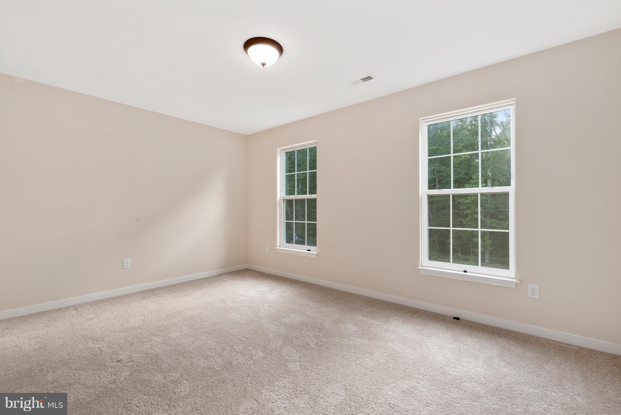 138 Sandy Ridge Road Fredericksburg, VA 22405 - Photo 17 of 30 an empty room with a window