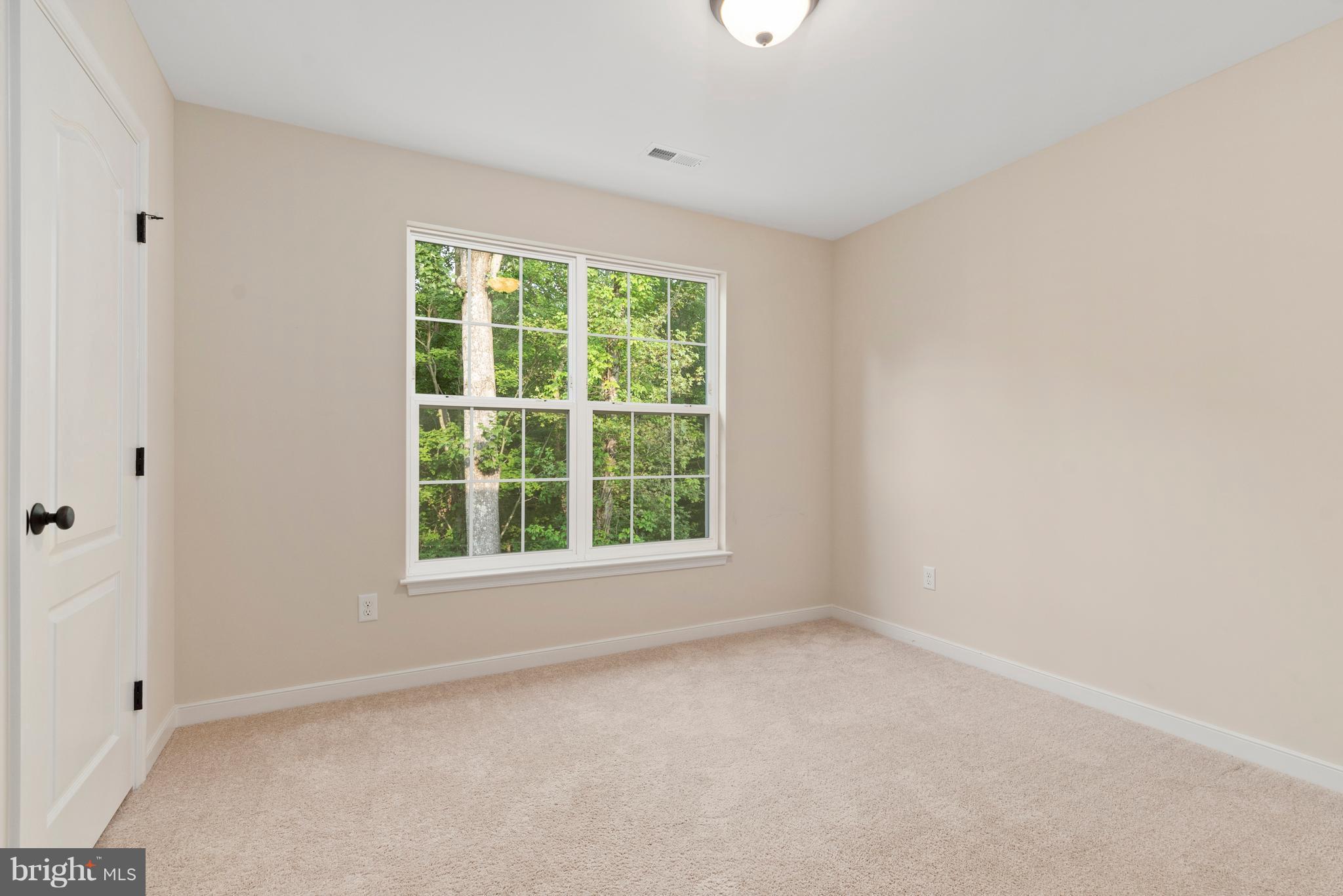 138 Sandy Ridge Road Fredericksburg, VA 22405 - Photo 19 of 30 an empty room with a window