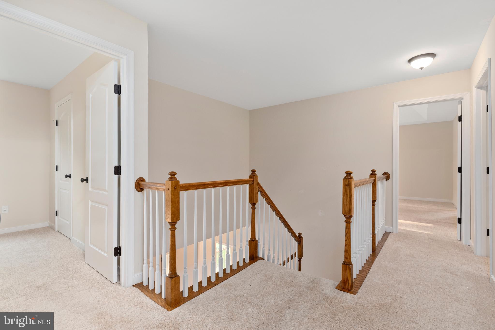 138 Sandy Ridge Road Fredericksburg, VA 22405 - Photo 20 of 30 a view of a hallway with white walls