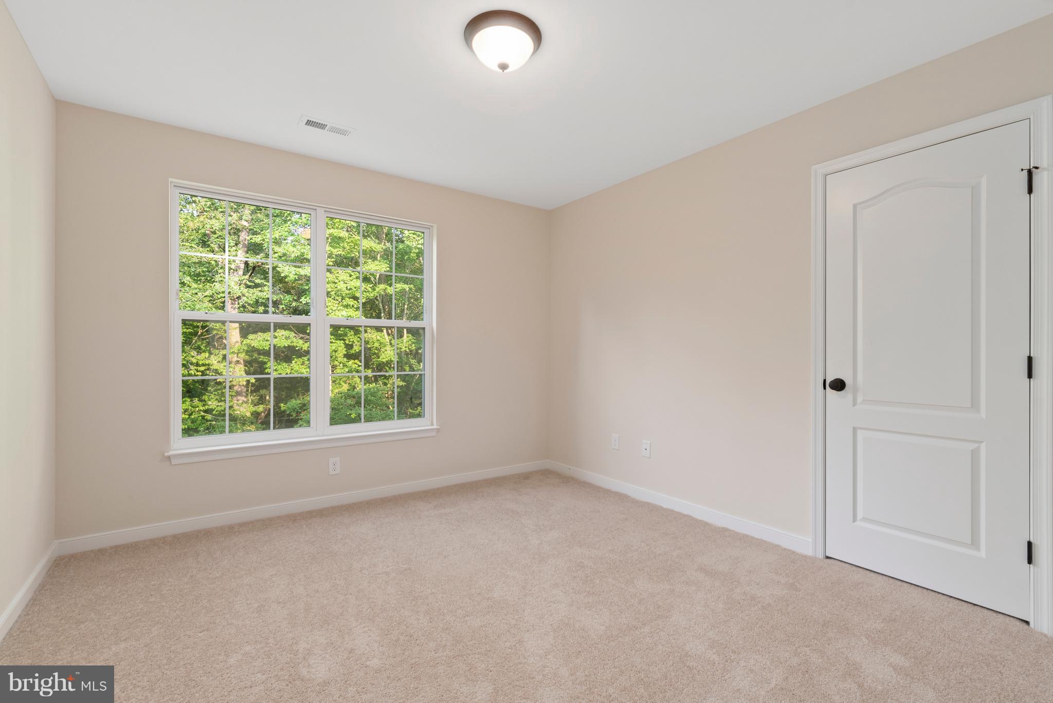 138 Sandy Ridge Road Fredericksburg, VA 22405 - Photo 21 of 30 an empty room with a window