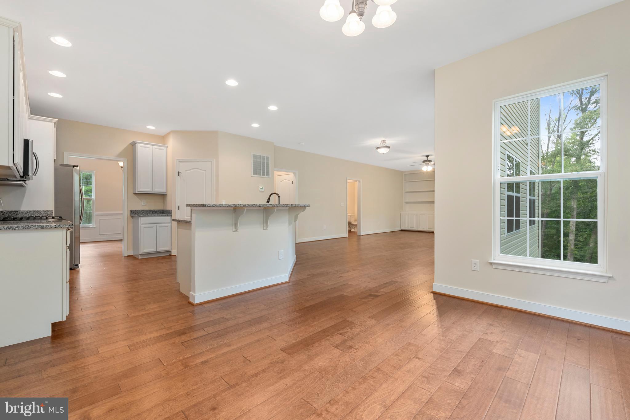 138 Sandy Ridge Road Fredericksburg, VA 22405 - Photo 6 of 30 a view of kitchen with cabinets and wooden floor