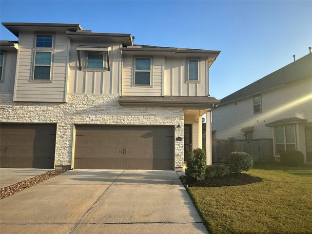 a front view of a house with yard