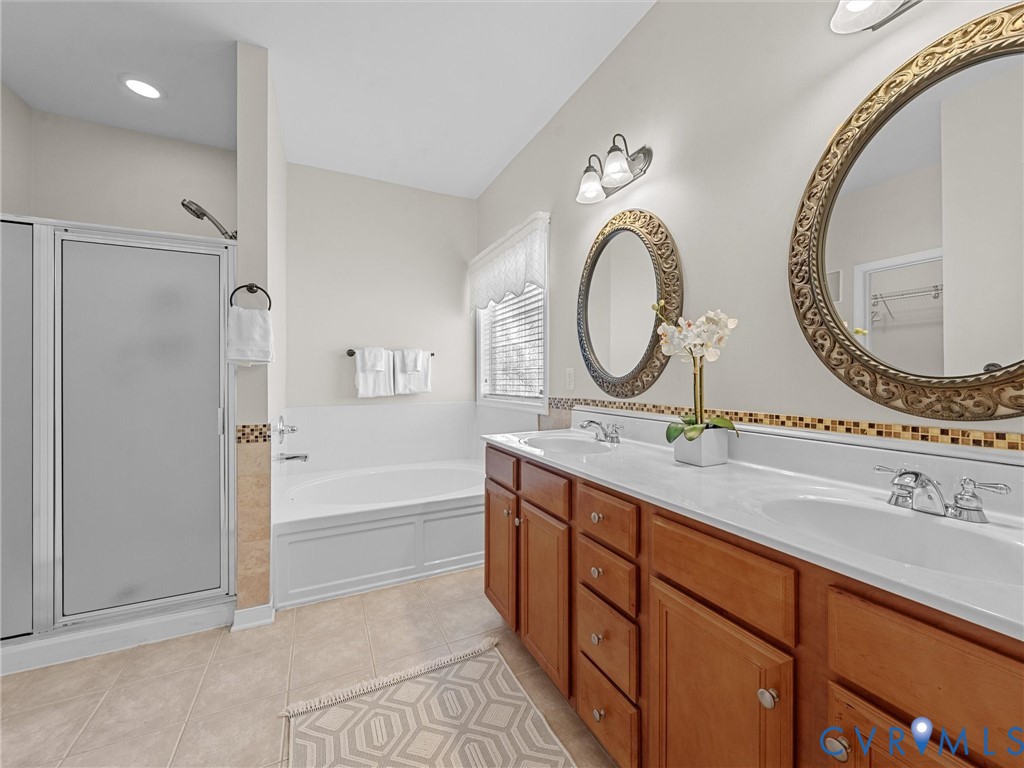 14300 Brading Court Midlothian, VA 23112 - Photo 25 of 50 Primary Bathroom:
“Spacious ensuite bath featurin
