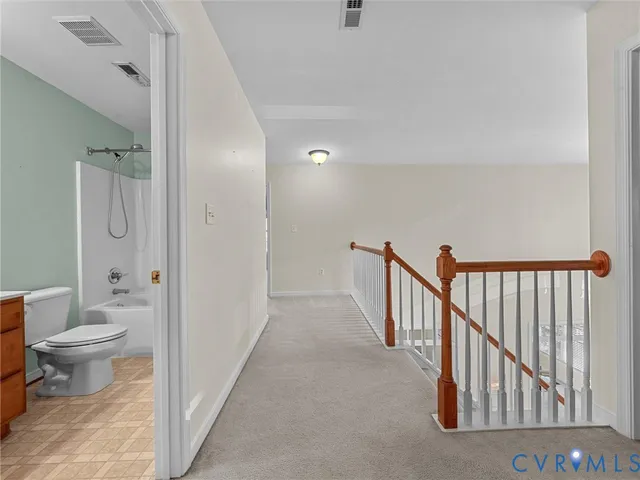 a view of a bathroom with toilet