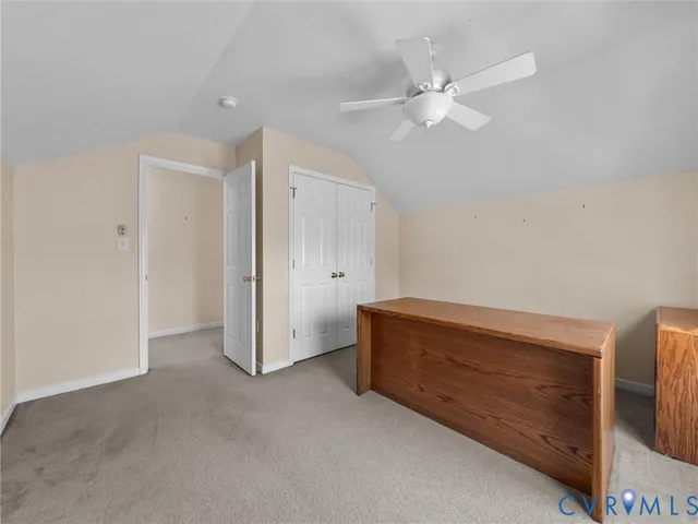 a living room with a ceiling fan