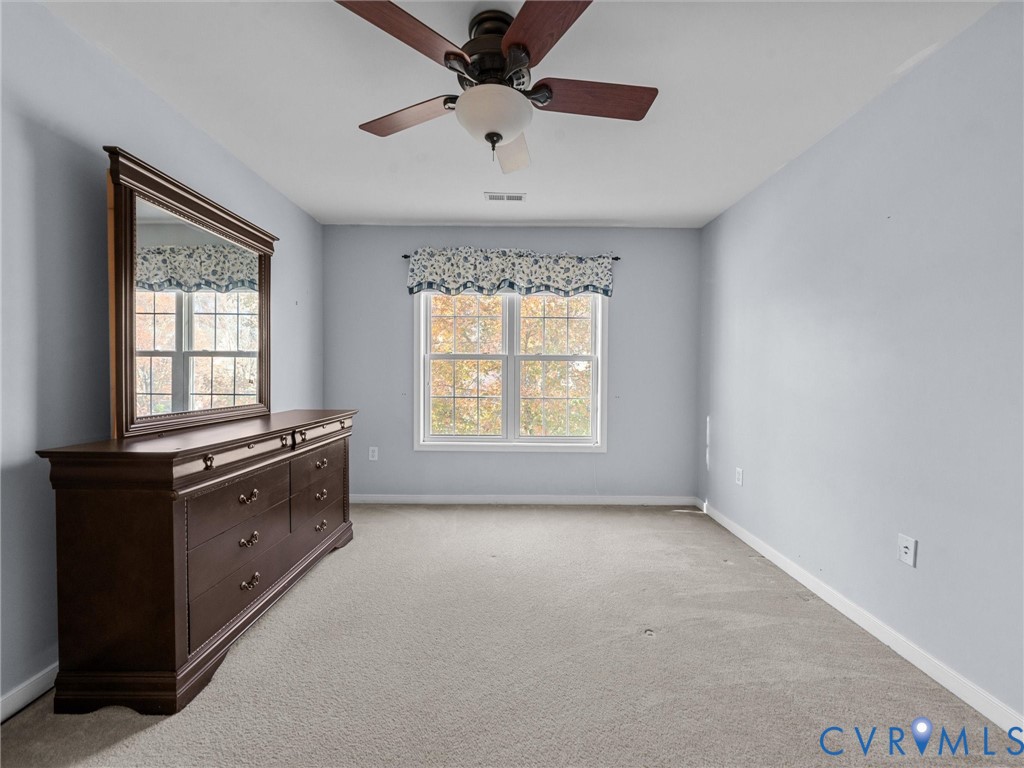 14300 Brading Court Midlothian, VA 23112 - Photo 37 of 50 Bedroom 4 (Upper Level):
“Bedroom 4 offers soft n