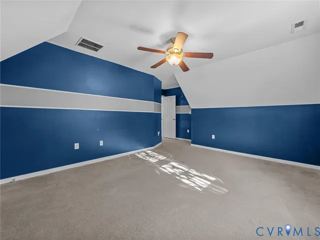 a view of game room with window and closet