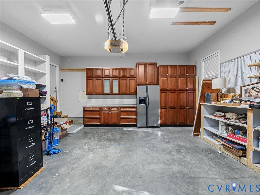 14300 Brading Court Midlothian, VA 23112 - Photo 42 of 50 Garage:
“Finished garage featuring abundant built