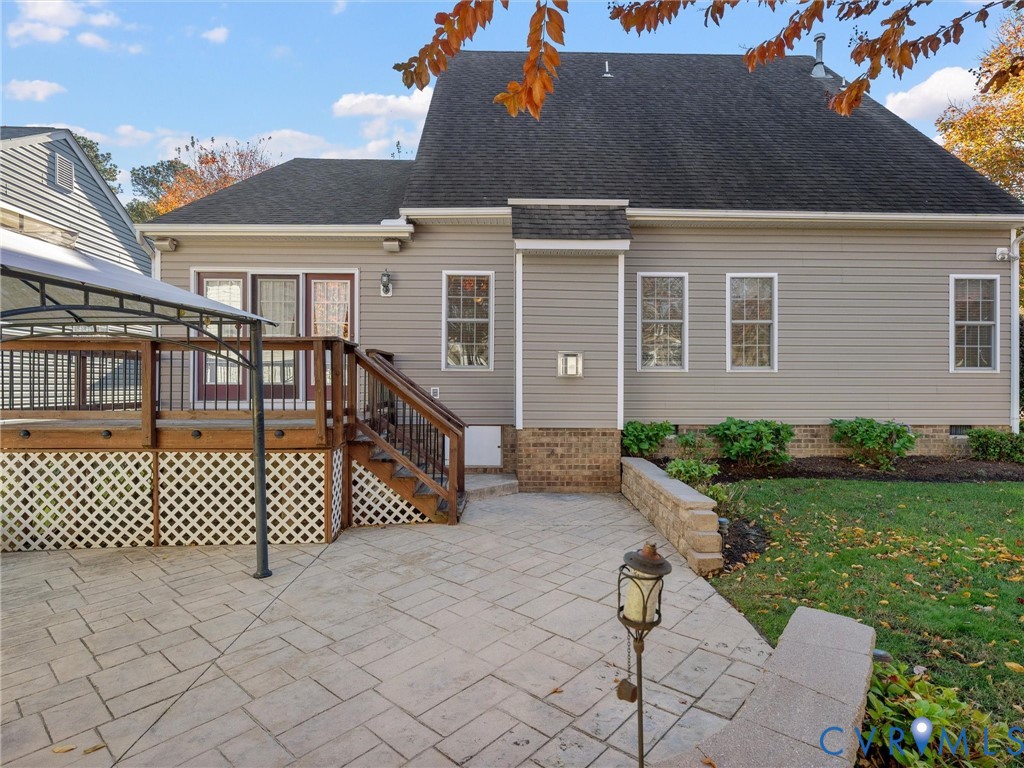 14300 Brading Court Midlothian, VA 23112 - Photo 45 of 50 Back Patio and Deck:
“Beautiful stamped concrete