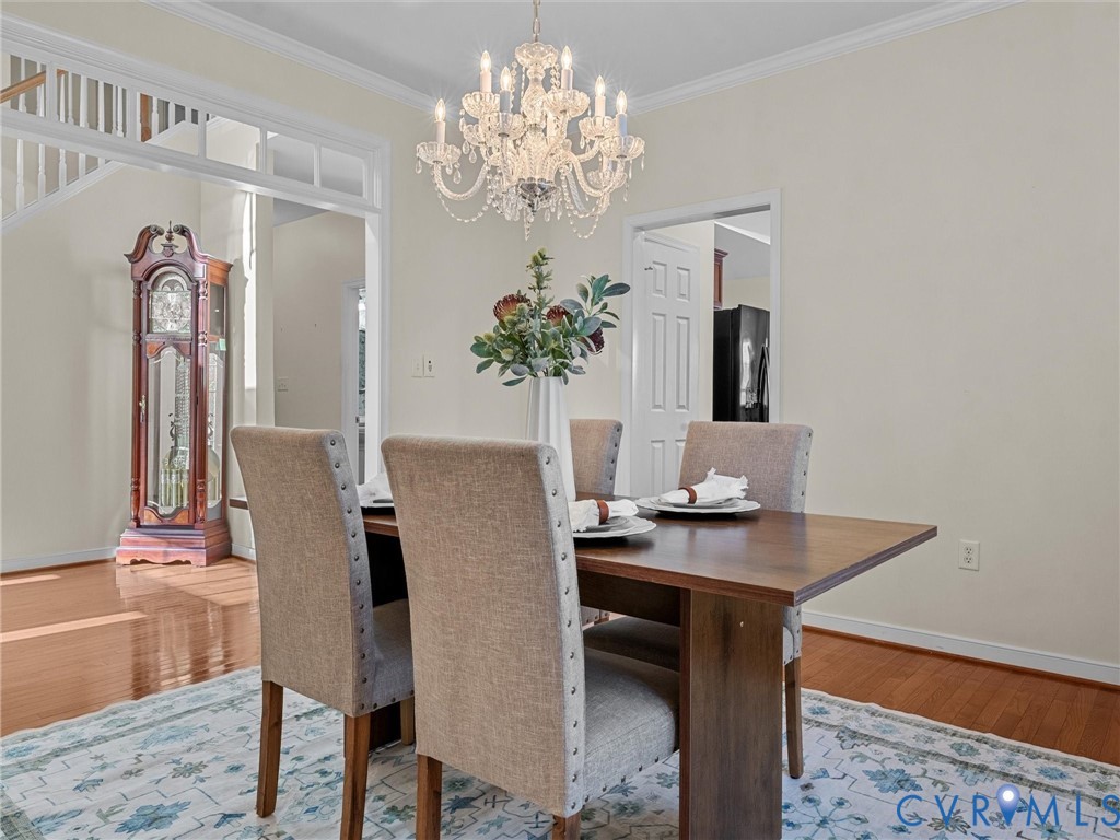 14300 Brading Court Midlothian, VA 23112 - Photo 10 of 50 Elegant dining room featuring hardwood floors, cro