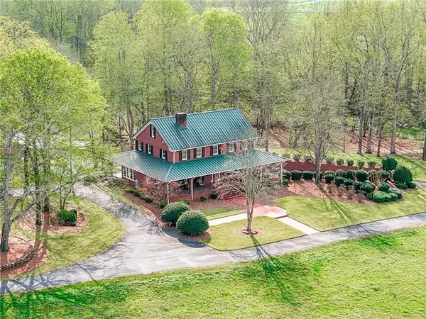 a view of a backyard with a patio