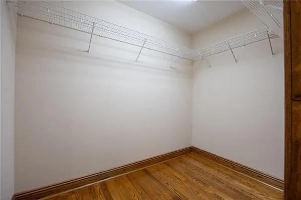 a view of a house with a yard and roof