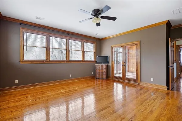 a bathroom with a glass door shower and a sink